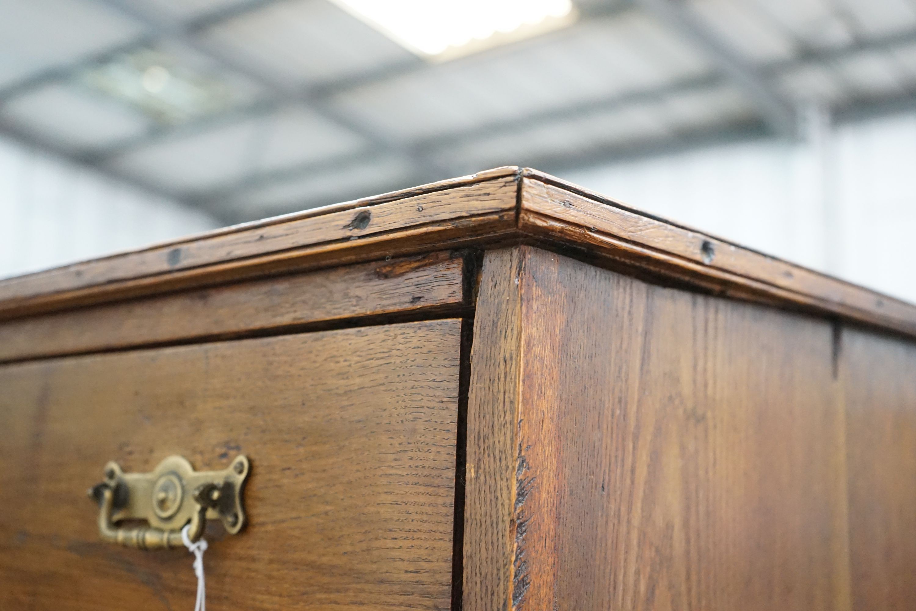 An early 20th century oak three drawer chest, width 77cm, depth 43cm, height 67cm together with an 18th century style oak joint stool